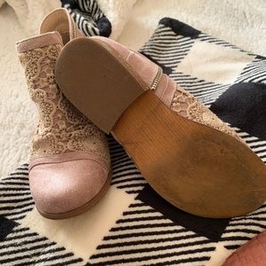 Cute lace on top of these ankle boots. Outside zipper. Like new, rounded toe